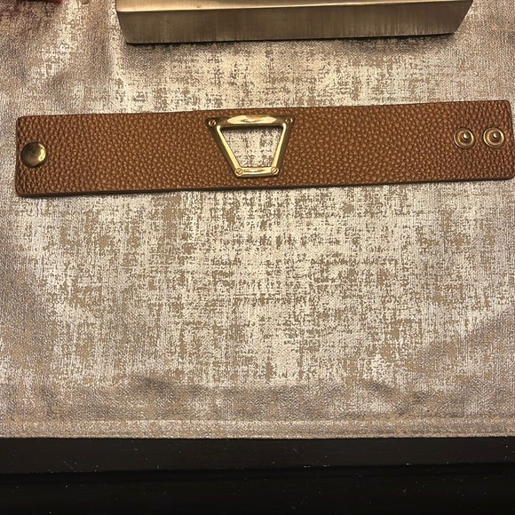 Jewelry - Bronze colored leather band with gold cut out